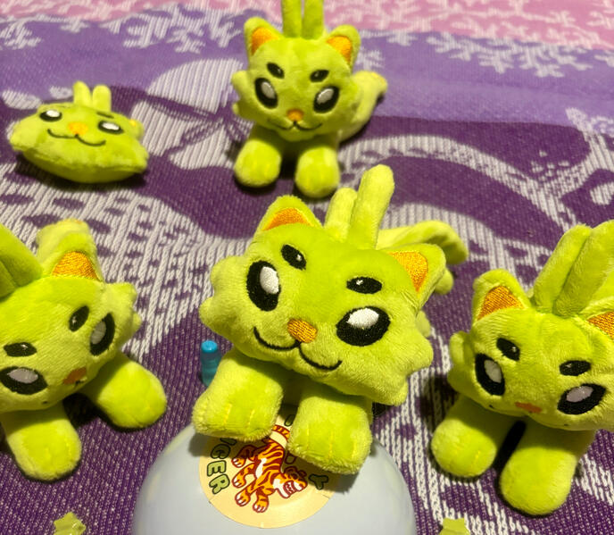 Alien cat plushies