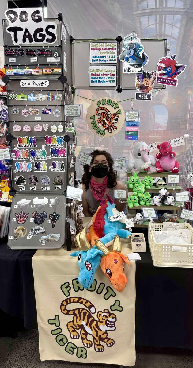 Bazaar dealers den photo for fwa 2026 with stuffed animals, stickers, dog tags, and mystery bags.